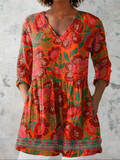 Marion - Blusa Alongada Decote V Floral Graúdo com Barrado