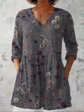 Audrey - Blusa Alongada Decote V Flores Silvestres Delicadas