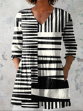 Sophie - Blusa Alongada Decote V Listras Geométricas