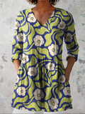 Elodie - Blusa Alongada Decote V Floral Retrô Ondulado